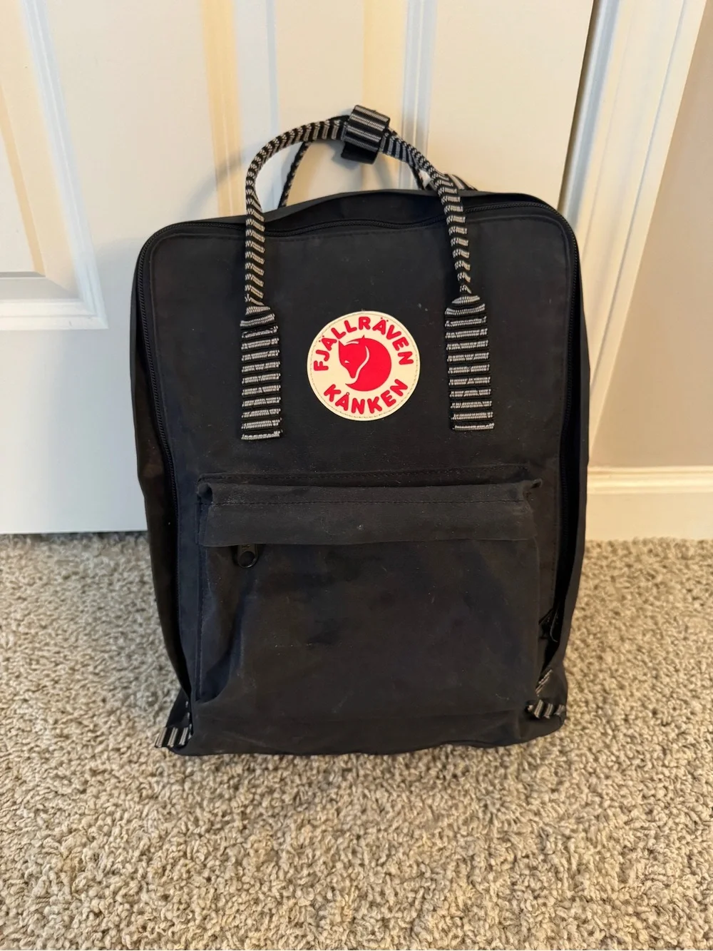 Fjallraven Kanken Backpack in Black with Red Logo